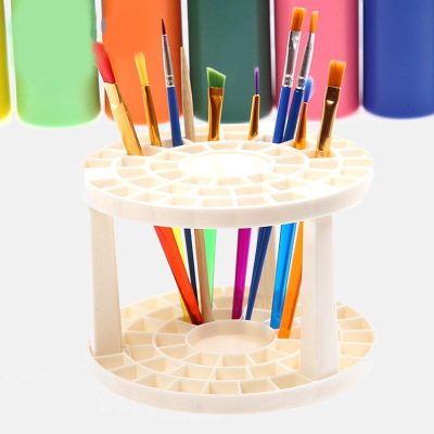 white paintbrush holder