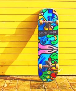 Colorful Skateboard On A Yellow Wall paint by numbers