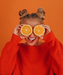 Girl In Orange Sweater Holding Lemon painting by numbers