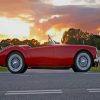 Red Coupe Soft Top On Road painting by numbers