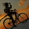 Silhouette Of Girl Riding A bike painting by numbers