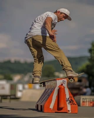 Skateboarder Doing A Slide Trick paint by numbers