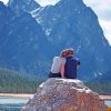 Couple Sitting On Rock paint by numbers